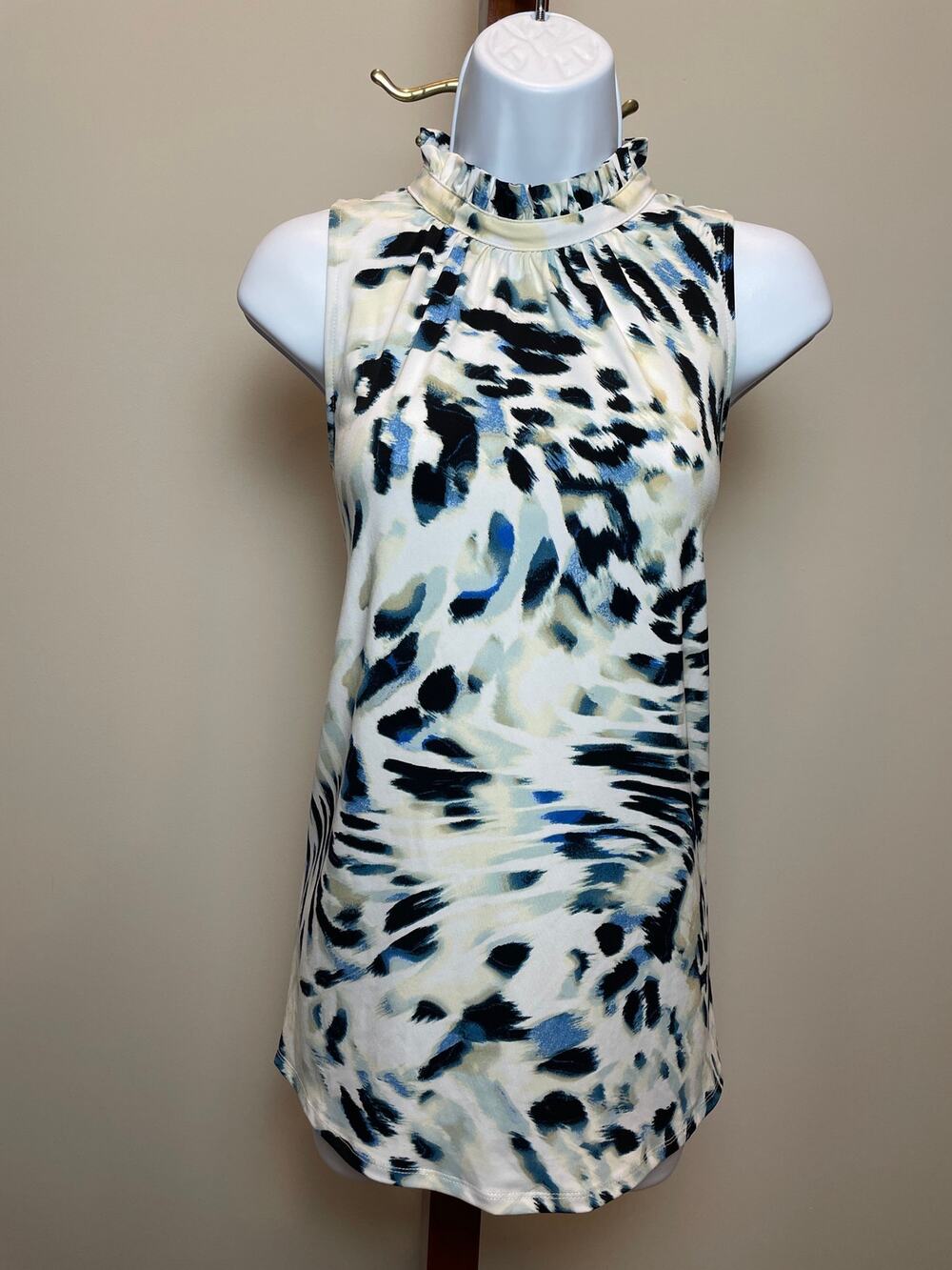The Limited Size M Sleeveless Mock Neck Top in Abstract Animal Print
